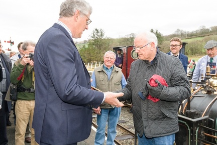 Julian Birley presents Peter Waterman with a replica nameplate of Quarry Hunslet “Winifred” at Llanuwchllyn