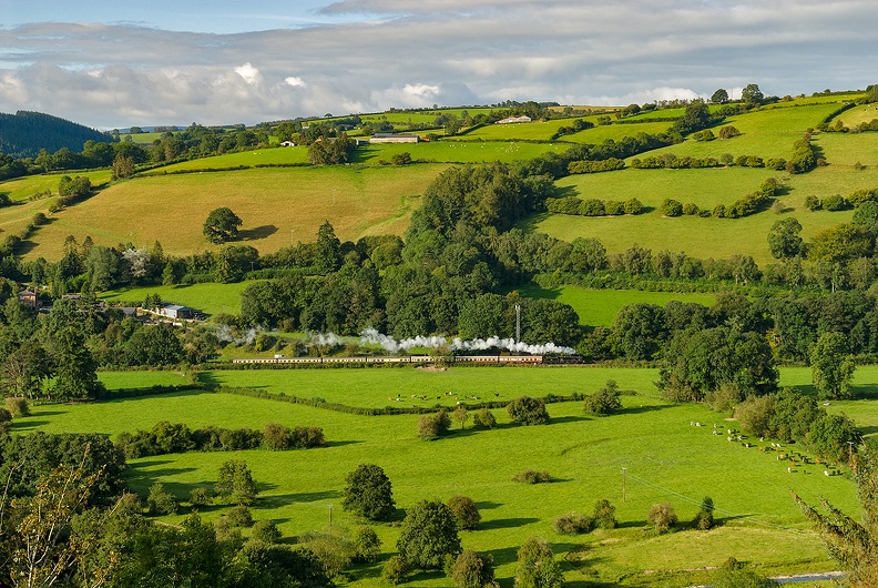 LMS 5MT 4-6-0 no. 45231 “The Sherwood Forester” accelerates away from Knighton on the Central Wales LIne on Pathfinder Railtours’ Sugar Loaf Mountaineer II 1Z31 05:33 Birmingham New Street to Carmarthen, a re-run of last year’s tour , which wasn’t able to be run to steam traction. flickr-48695405886.jpg
